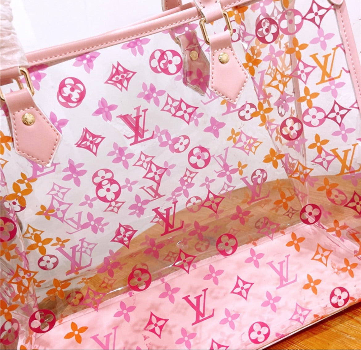 Pink transparent LV a woman handbag